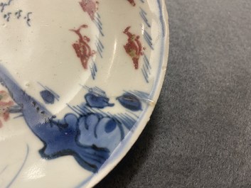 Two Chinese blue, white and copper-red 'fish' plates, Transitional period