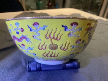 A Chinese yellow-ground famille rose 'dragon and phoenix' bowl, Xuantong mark and of the period