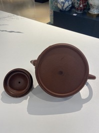 Two Chinese Yixing stoneware teapots and a famille rose 'Shou Lao' group, Kangxi and 20th C.