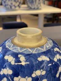 A pair of Chinese blue and white covered bowls on stands and a pair of covered jars, 19th C.