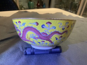 A Chinese yellow-ground famille rose 'dragon and phoenix' bowl, Xuantong mark and of the period