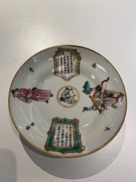 Une tasse couverte et soucoupe en porcelaine de Chine famille rose &agrave; d&eacute;cor 'Wu Shuang Pu', marque et &eacute;poque de Daoguang