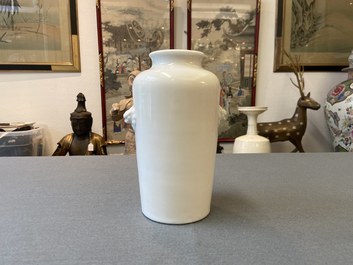 A Chinese Dehua blanc de Chine rouleau vase, Kangxi