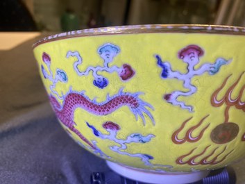 A Chinese yellow-ground famille rose 'dragon and phoenix' bowl, Xuantong mark and of the period