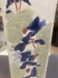 A Chinese blue and white, celadon and copper-red tapering square vase with landscape panels, Kangxi