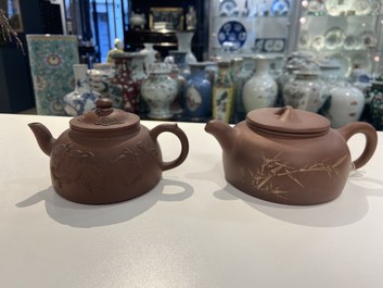 Two Chinese Yixing stoneware teapots and a famille rose 'Shou Lao' group, Kangxi and 20th C.