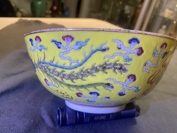 A Chinese yellow-ground famille rose 'dragon and phoenix' bowl, Xuantong mark and of the period