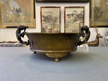 A large Chinese bronze tripod censer with chilong handles, Xuande mark, 18/19th C.
