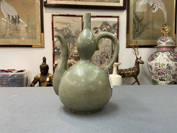 A Korean inlaid-celadon stoneware ewer, probably Goryeo, 13/14th C.