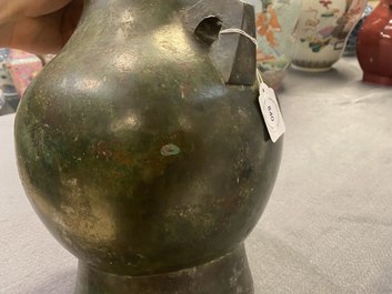 A Chinese archaistic bronze 'hu' vase with inscription, Ming