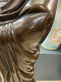 An exceptionally large Chinese silver-inlaid bronze figure of Guanyin, Yutang Shi Sou mark, Qing