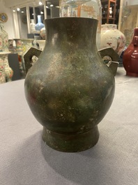 A Chinese archaistic bronze 'hu' vase with inscription, Ming