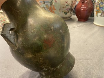 A Chinese archaistic bronze 'hu' vase with inscription, Ming