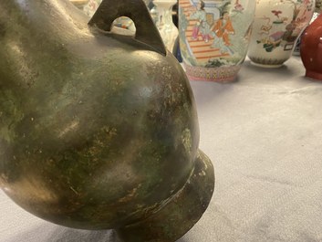 A Chinese archaistic bronze 'hu' vase with inscription, Ming