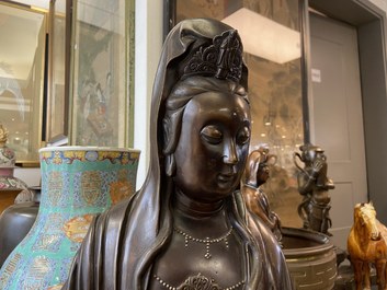 An exceptionally large Chinese silver-inlaid bronze figure of Guanyin, Yutang Shi Sou mark, Qing