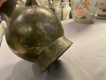 A Chinese archaistic bronze 'hu' vase with inscription, Ming