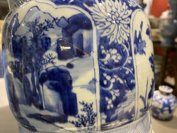 Een Chinese blauw-witte 'gu' vaas met landschaps- en florale medaillons, Kangxi
