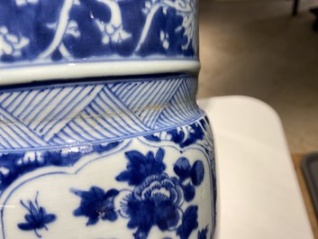 Een Chinese blauw-witte 'gu' vaas met landschaps- en florale medaillons, Kangxi
