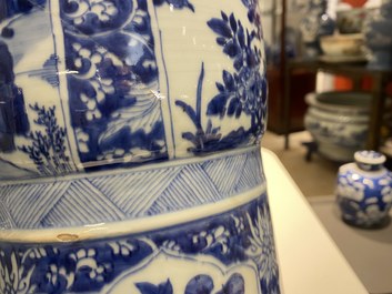 A Chinese blue and white 'gu' vase with floral and lanscape panels, Kangxi