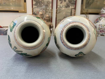 A pair of Chinese wucai 'meiping' vases, 19th C.