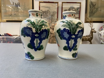 A pair of Chinese wucai 'meiping' vases, 19th C.