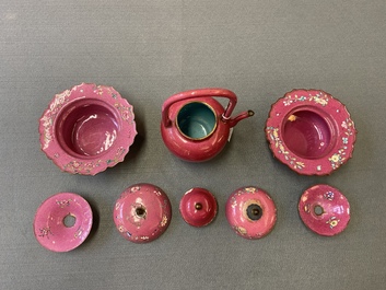 A Chinese ruby-ground Canton enamel teapot and a pair of covered bowls, Qianlong/Jiaqing