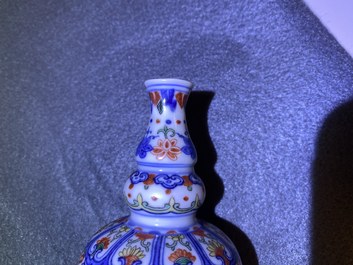 A Chinese famille rose vase, a 'dragon' bowl and a wucai vase, Republic