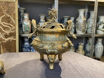 A large Chinese bronze censer and cover on stand with sea animals and shells, Qing