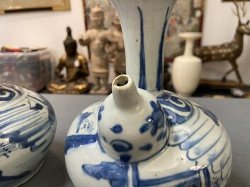A pair of Chinese blue and white kendi depicting a figure in a landscape, Wanli