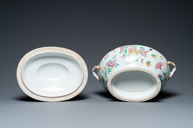 A Chinese Canton famille rose 'butterflies' tureen and cover on stand, 19th C.