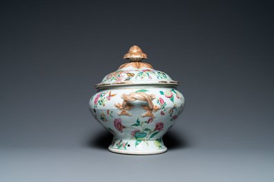 A Chinese Canton famille rose 'butterflies' tureen and cover on stand, 19th C.