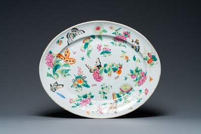 A Chinese Canton famille rose 'butterflies' tureen and cover on stand, 19th C.