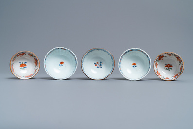 A Chinese Imari-style porringer, a mug, a bowl and five cups and saucers, Kangxi/Qianlong