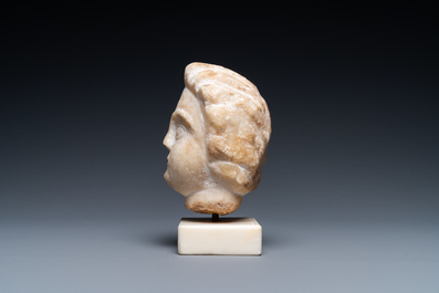 A Roman provicincial marble head of a boy, 2nd/3rd C.