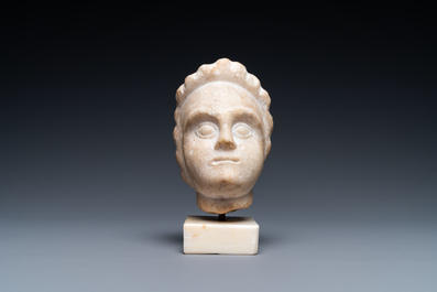 A Roman provicincial marble head of a boy, 2nd/3rd C.