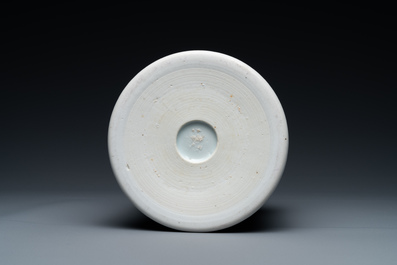 A Chinese blue and white brush pot with a landscape and antiquities, Kangxi