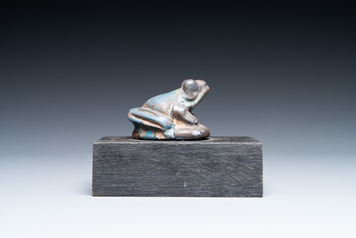An Egyptian cobalt blue- and turquoise-glazed faience model of a frog, 15/11th C. BC