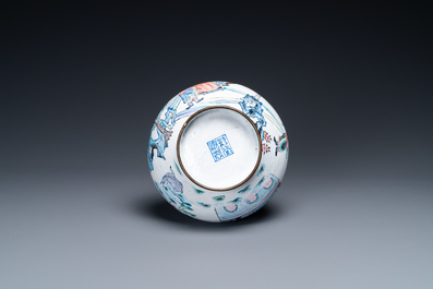 A Chinese Canton enamel bottle vase, Qianlong mark, 19th C.