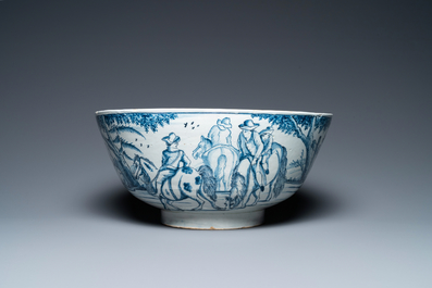 A large Dutch Delft blue and white bowl with shepherds on horsebacks, 18th C.