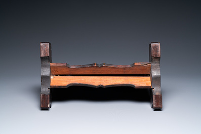 A Chinese square fahua plaque mounted in a wooden table screen, Ming