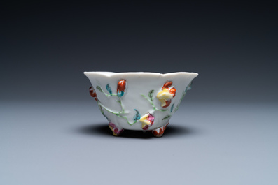 A Chinese famille rose relief-decorated libation cup, Yongzheng