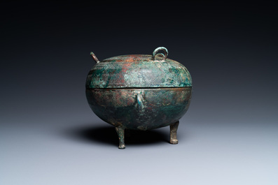 A Chinese bronze ritual tripod 'dui' food vessel and cover, Eastern Zhou