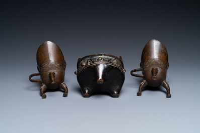 Two Chinese small bronze 'jue' ewers and a tripod censer, probably Yuan