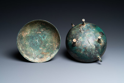 A Chinese bronze ritual tripod 'dui' food vessel and cover, Eastern Zhou