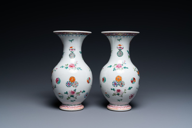 A pair of Chinese famille rose vases, Yongzheng mark, 19/20th C.