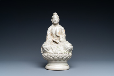 A pale celadon-glazed figure of Quan Am, North-Vietnam, 17/18th C.