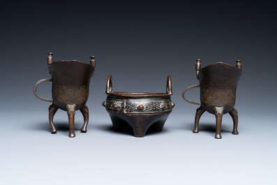 Two Chinese small bronze 'jue' ewers and a tripod censer, probably Yuan