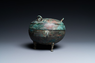 A Chinese bronze ritual tripod 'dui' food vessel and cover, Eastern Zhou