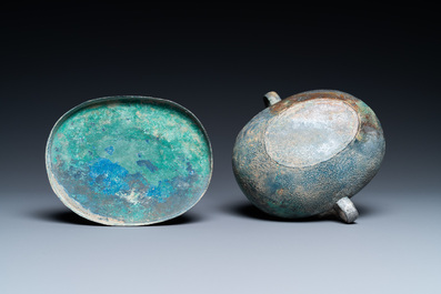 A Chinese archaic bronze 'zhou' bowl and cover, Spring and Autumn period