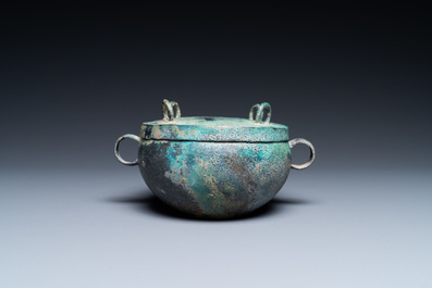 A Chinese archaic bronze 'zhou' bowl and cover, Spring and Autumn period